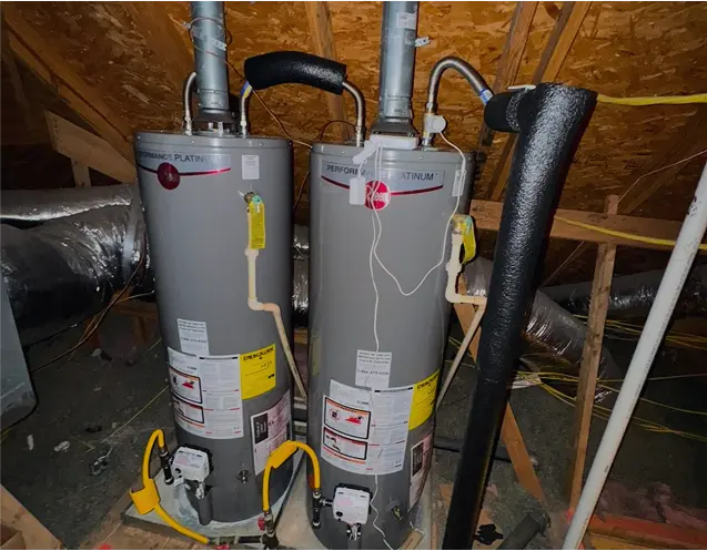 Dallas hot water heater replacement expert removing an old unit from a residential home